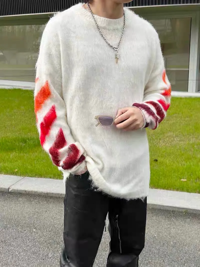 ♻️💯Upper body reference model picture❤️New top-quality proven version OFFWHITE (OW) gradient mohair striped arrow sweater hoodie gradient rendering arrow couple sweater Mohair (English Mohair; Turkish: MUKHYAR) refers to the coat of Angora goats, also known as Angora goat hair. The name comes from Turkish, meaning "the best hair". It has good elasticity, pressure resistance and special luster. It is an excellent raw material for making plush fabrics and one of the most advanced animal textile fiber raw materials in the world market. Mohair has a shape similar to long wool. The fiber surface is smooth, strong luster, high strength, good elasticity, less curl, and easy to wash. Mohair can be used in jacquard blankets, long-haired coats and high-gloss wool fabrics. Mohair sweaters from ow are released every year🛒 The same style and ever-changing colors. There is really no girl who doesn’t love it. It is super suitable for wearing under a down jacket in winter without being bulky! If the lower body is missing, their favorite os version🙋🏻‍♀️ intuitively adds natural softness and fairy beauty effect, which is the best choice! The upper body is lightweight and does not weigh down the body while keeping warm. The sleeves and the gradient arrow parts on the back are repeatedly patterned until the gradient level is satisfied before large-scale products are released. The craftsmanship is extremely demanding. Each sweater is woolen at least ten times to give it a plush, thick feel and good fluffiness! ✅ Fabric composition: 50% mohair 32 spandex 18% wool, three-level anti-pilling Color: black and white gradient Sizes Mohair is lighter and softer, so be careful not to machine wash it, not machine washable! ! emphasize! !  ⚠️Hand wash with warm water and cold water P:440
